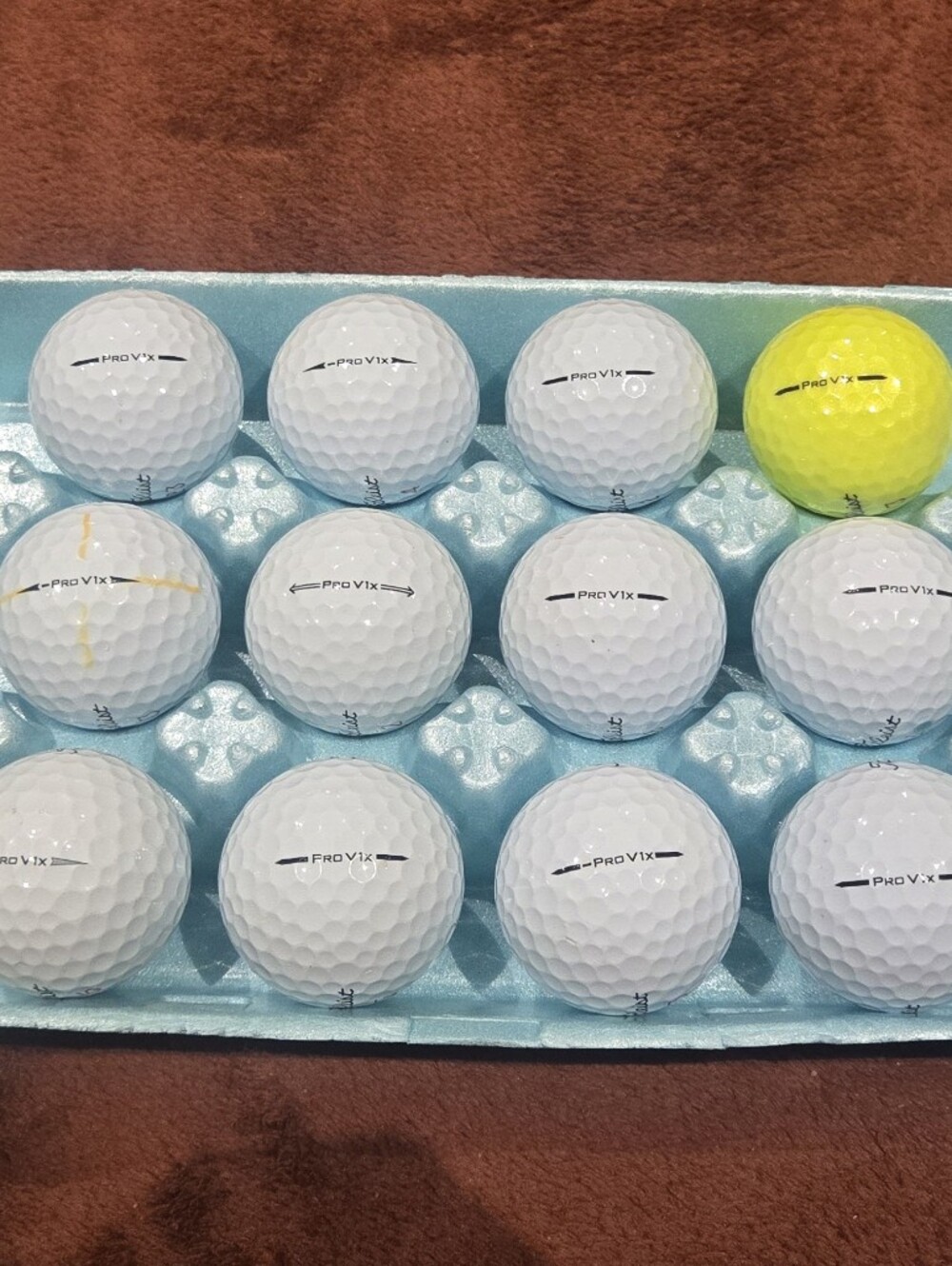 12 Titleist ProV1x Golf Balls. 11 White. 1 Yellow. Pristine Playing Condition. - Picture 2 of 3